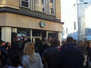Crowd outside a Starbucks that was shutdown during our last UK Uncut action